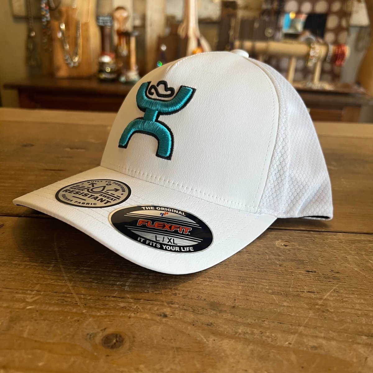 Discover Hooey "Coach" White Hat w/Blue & Charcoal Logo Quality Hooey Hats located at The Revival.