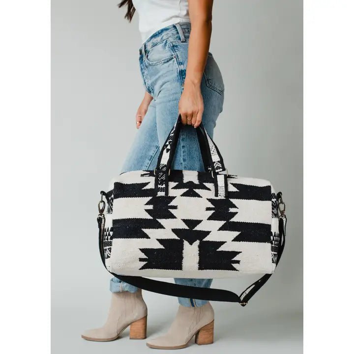 Discover Panache Apparel Co. Cream & Black Aztec Duffel Quality Panache Apparel Co. Duffel Bag located at The Revival.