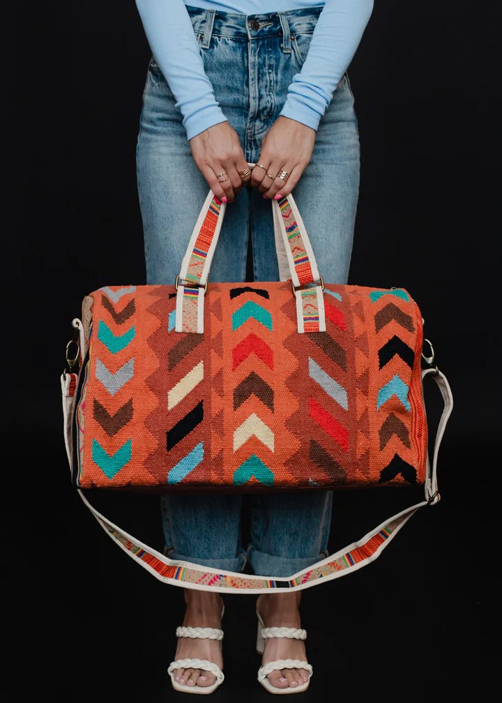 Discover Panache Apparel Co. Good Karma Duffel Quality Panache Apparel Co. Duffel Bag located at The Revival.