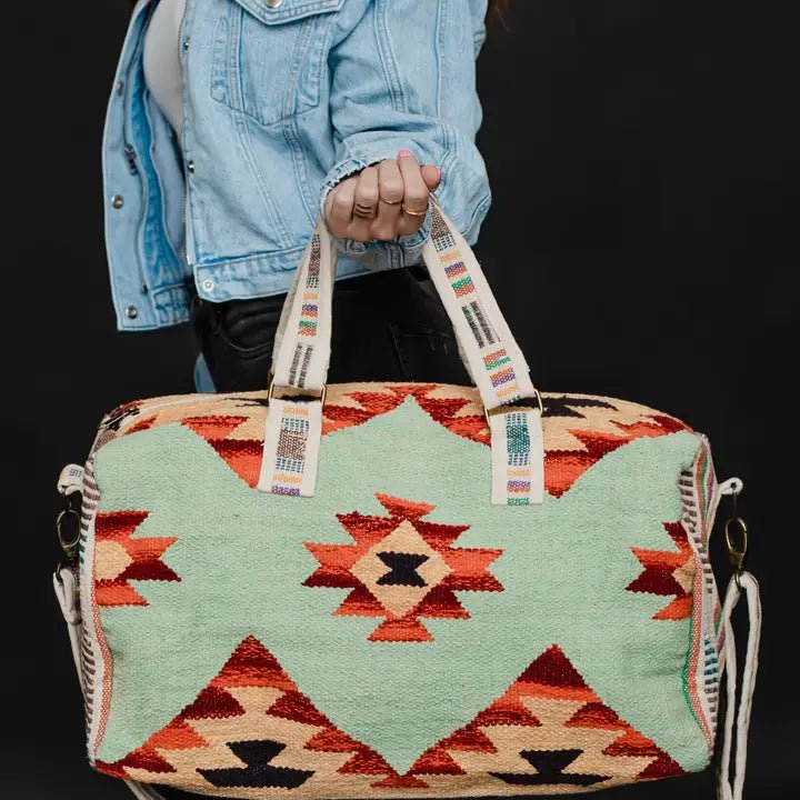 Discover Panache Apparel Co. Mint & Multicolored Aztec Duffel Quality Panache Apparel Co. Duffel Bag located at The Revival.