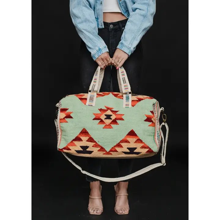 Discover Panache Apparel Co. Mint & Multicolored Aztec Duffel Quality Panache Apparel Co. Duffel Bag located at The Revival.